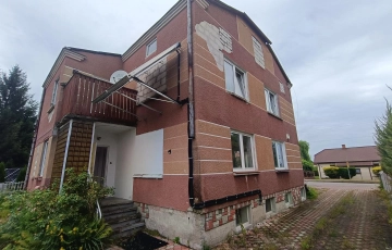 Zdjęcie główne ogłoszenia Syndyk sprzeda nieruchomość gruntową zabudowaną