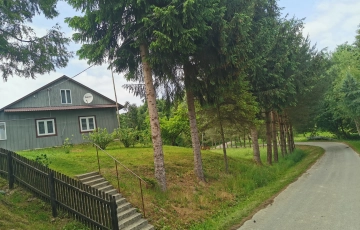 Zdjęcie główne ogłoszenia Do sprzedania dom drewniany z działkom o pow. 0.21 ha w Piątkowej gmina Błażowa