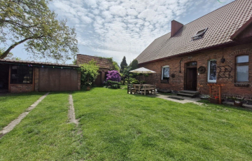 Zdjęcie główne ogłoszenia Mieszkanie w domu z ogródkiem, garażem.