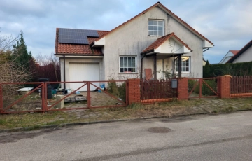 Zdjęcie główne ogłoszenia Syndyk sprzeda udział ½ w nieruchomości zabudowanej