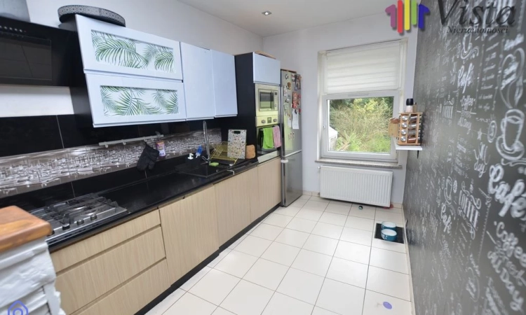 Dwupoziomowe mieszkanie z kominkiem | Zdjęcie główne