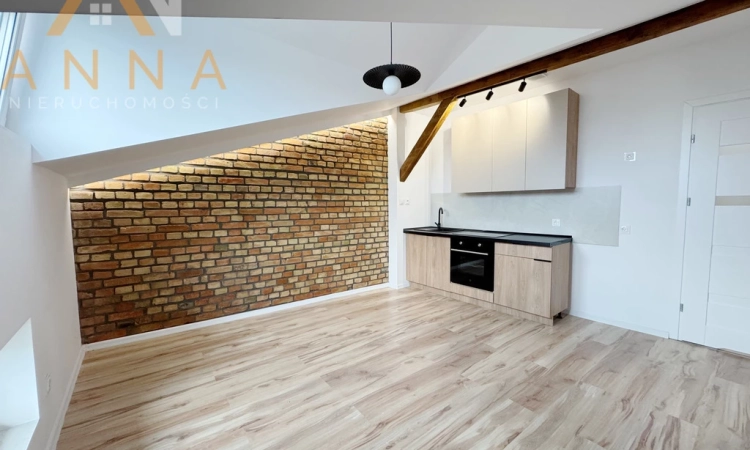 Urokliwe mieszkanie na poddaszu w kamienicy | Zdjęcie główne