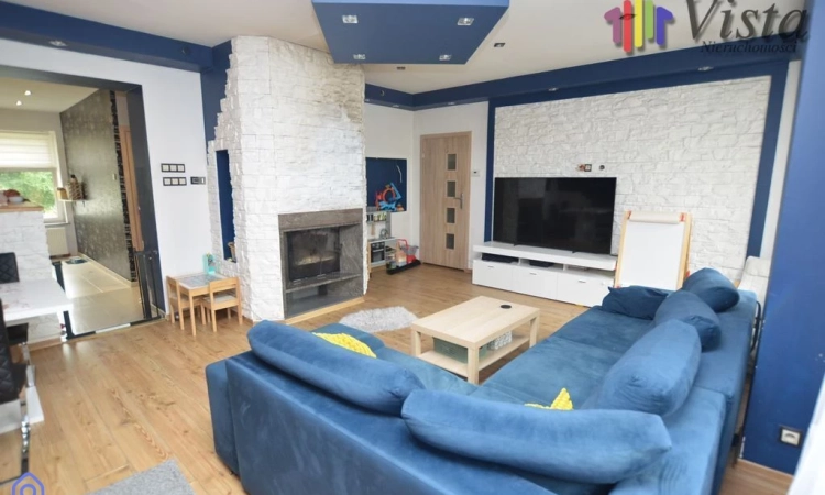 Dwupoziomowe mieszkanie z kominkiem | Zdjęcie główne