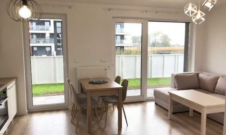 Mieszkanie z ogródkiem garażem podziemnym | Zdjęcie główne